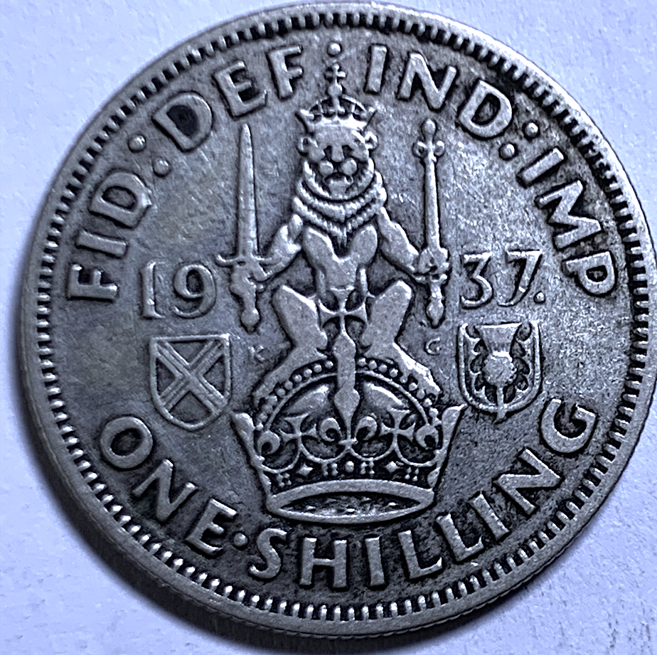 Un chelín británico de 1937 – Emisión del primer año – Jorge VI – KM#851a – 0,500 Plata