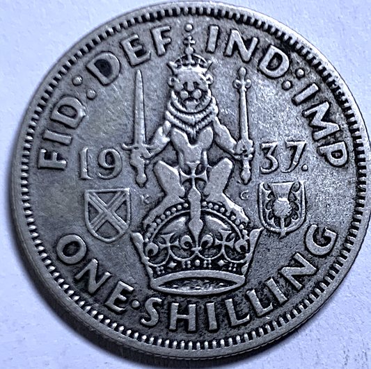 Un chelín británico de 1937 – Emisión del primer año – Jorge VI – KM#851a – 0,500 Plata