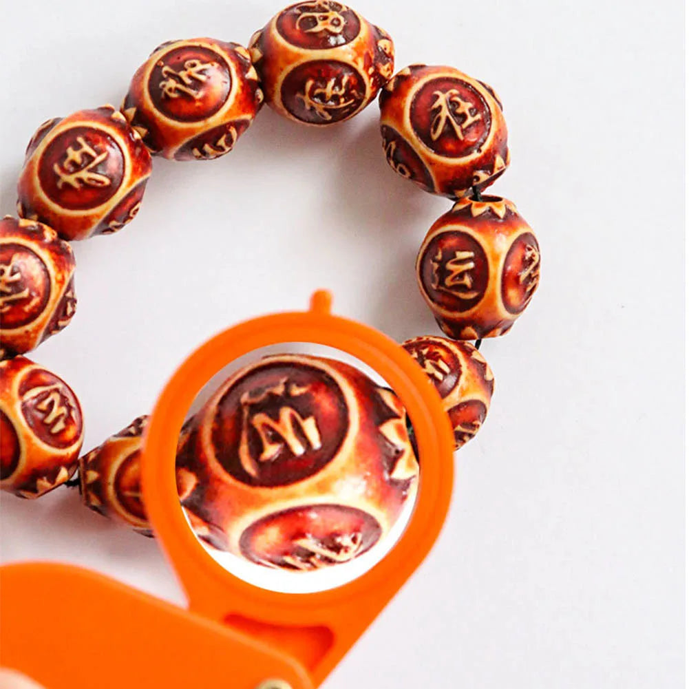 Lupa de bolsillo plegable de 10 aumentos: llavero ligero para viajes y uso doméstico.